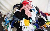 Россиянам могут запретить выбрасывать одежду в мусорные баки 